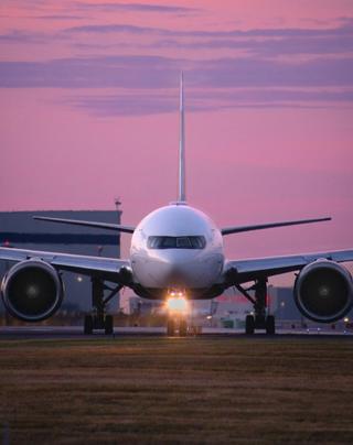 Plane in transit on the runway at an airport