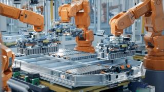 EV Battery Pack Automated Production Line Equipped with Orange Robot Arms